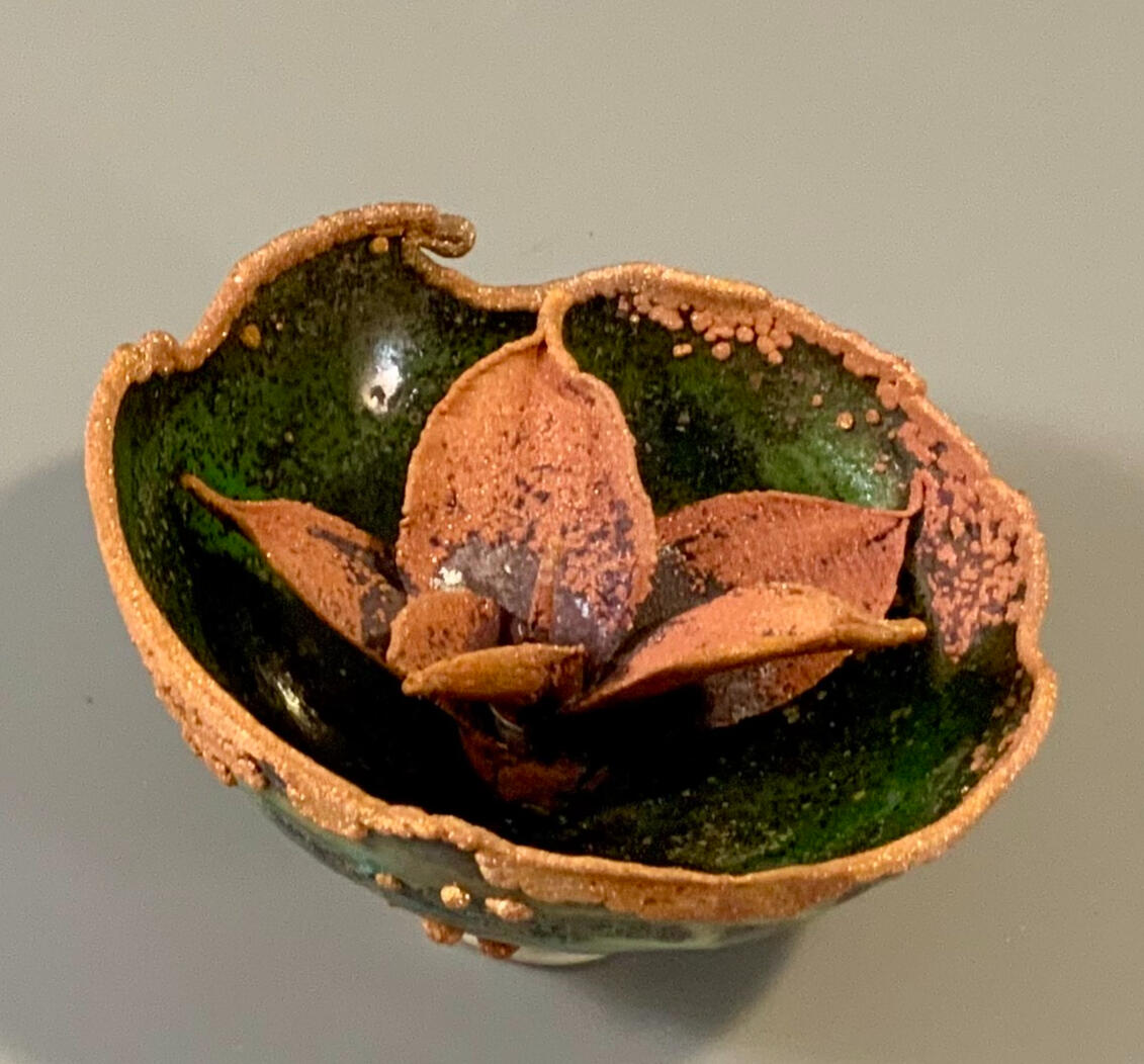 Hand formed nest with cast agave, electroform and glass